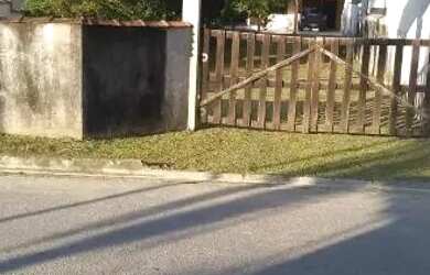 Imagem: A casa possui 3 Dormitórios, 3 Banheiros, 5 Vagas na garagem