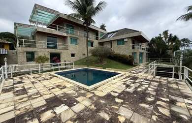 Imagem: A casa em condomínio possui 4 Dormitórios, 5 Banheiros, 5