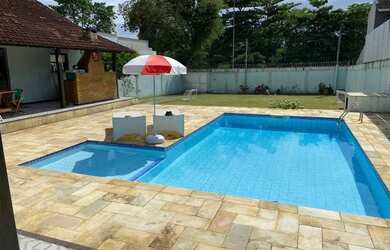 Imagem: A casa e possui 4 Dormitórios, Suítes, Banheiros, Acomodam