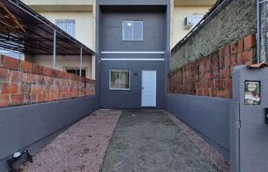 Imagem: A casa possui 2 Dormitórios, 2 Banheiros e 52m² de Área e