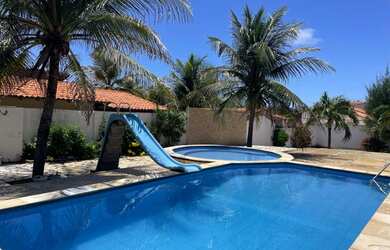 Imagem: A casa possui 5 Dormitórios, 5 Vagas na garagem e está localizado