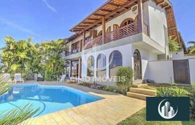 Imagem: A casa possui 4 Dormitórios, 3 Banheiros, 2 Vagas na garagem