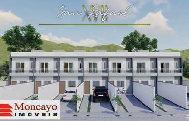 Imagem: A casa possui 2 Dormitórios, 1 Banheiro, 2 Vagas na garagem