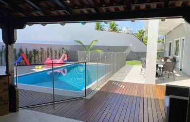 Imagem: A casa em condomínio possui 5 Dormitórios, 5 Banheiros, 5