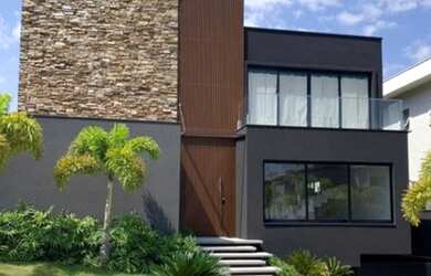 Imagem: A casa em condomínio possui 4 Dormitórios, 5 Banheiros, 5