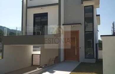 Imagem: A casa possui 3 Dormitórios, 4 Banheiros, 4 Vagas na garagem