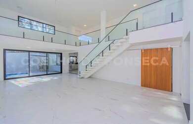 Imagem: A casa em condomínio possui 4 Dormitórios, 5 Banheiros, 4