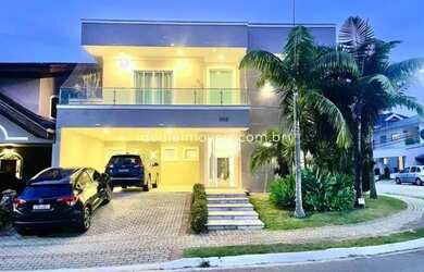 Imagem: A casa em condomínio possui 4 Dormitórios, 5 Banheiros, 4