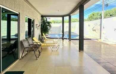 Imagem: A casa possui 5 Dormitórios, 3 Banheiros, 5 Vagas na garagem