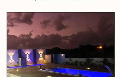 Imagem: A casa possui 4 Dormitórios, 5 Banheiros, 5 Vagas na garagem