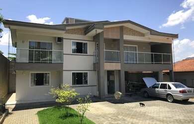 Imagem: A casa possui 4 Dormitórios, 4 Banheiros, 2 Vagas na garagem