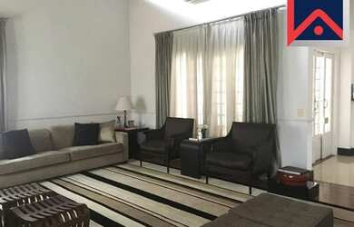 Imagem: A casa possui 4 Dormitórios, 4 Banheiros, 5 Vagas na garagem