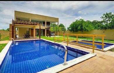 Imagem: A casa em condomínio possui 4 Dormitórios, 5 Banheiros, 4