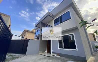 Imagem: A casa possui 2 Dormitórios, 3 Banheiros, 2 Vagas na garagem