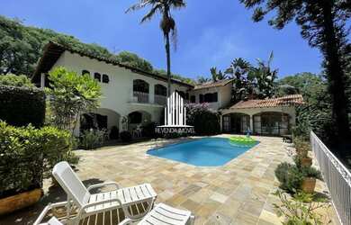 Imagem: A casa possui 4 Dormitórios, 5 Banheiros, 5 Vagas na garagem