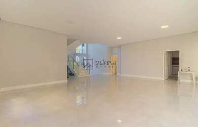 Imagem: A casa possui 4 Dormitórios, 5 Banheiros, 5 Vagas na garagem