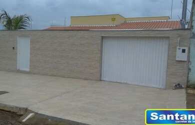 Imagem: A casa possui 3 Dormitórios, 3 Banheiros, 4 Vagas na garagem