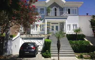 Imagem: A casa em condomínio possui 4 Dormitórios, 5 Banheiros, 4