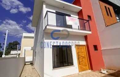 Imagem: A casa possui 3 Dormitórios, 3 Banheiros, 2 Vagas na garagem