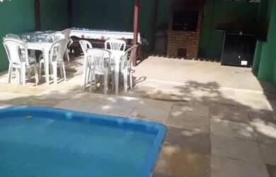 Imagem: A casa possui 4 Dormitórios, 3 Vagas na garagem e está localizado