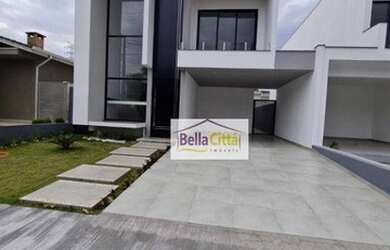 Imagem: A casa em condomínio possui 4 Dormitórios, 5 Banheiros, 4