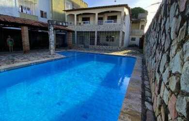 Imagem: A casa possui 4 Dormitórios, 3 Banheiros, 3 Vagas na garagem