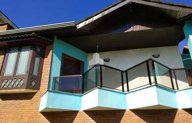 Imagem: A casa possui 3 Dormitórios, 4 Banheiros e 265m² de Área