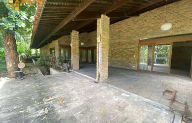 Imagem: A casa possui 3 Dormitórios, 5 Banheiros, 5 Vagas na garagem