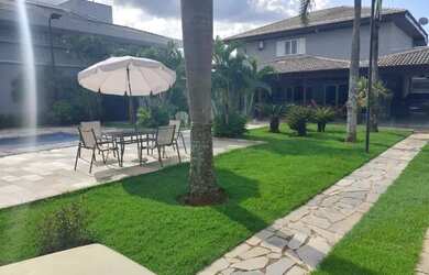 Imagem: A casa possui 5 Dormitórios, 5 Banheiros, 5 Vagas na garagem