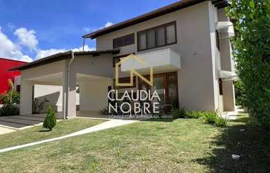 Imagem: A casa em condomínio possui 4 Dormitórios, 4 Banheiros, 261m²