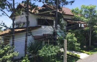 Imagem: A casa em condomínio possui 3 Dormitórios, 4 Banheiros, 4