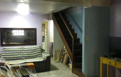 Imagem: A casa possui 2 Dormitórios, Acomodam 7 pessoas, 2 Vagas na