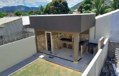 Imagem: A casa possui 2 Dormitórios, 1 Banheiro, 2 Vagas na garagem