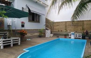 Imagem: A casa possui 5 Dormitórios, 5 Banheiros, 5 Vagas na garagem