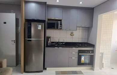 Imagem: O apartamento possui 2 Dormitórios, 1 Banheiro, 1 Vaga na garagem