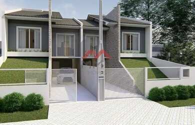 Imagem: A casa possui 3 Dormitórios, 1 Banheiro, 2 Vagas na garagem