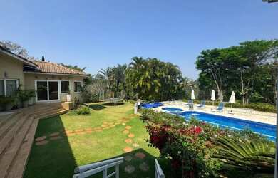 Imagem: A casa em condomínio possui 5 Dormitórios, 5 Banheiros, 5