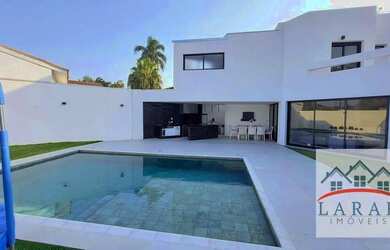 Imagem: A casa em condomínio possui 5 Dormitórios, 5 Banheiros, 5