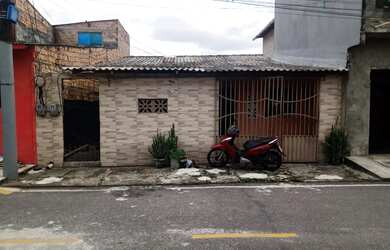 Imagem: A casa possui 3 Dormitórios, 1 Banheiro e está localizado