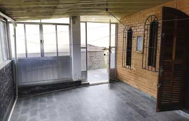 Imagem: A casa possui 5 Dormitórios, 4 Banheiros, 2 Vagas na garagem