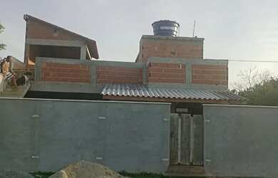 Imagem: A casa possui 2 Dormitórios, 2 Banheiros e está localizado