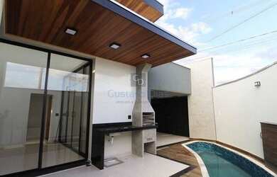 Imagem: A casa possui 3 Dormitórios, 2 Banheiros, 2 Vagas na garagem