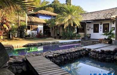 Imagem: A casa em condomínio possui 4 Dormitórios, 5 Banheiros, 5