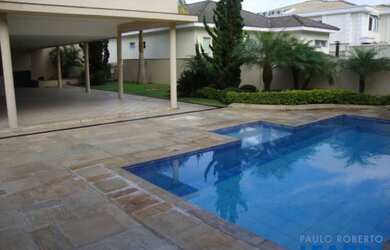 Imagem: A casa em condomínio possui 4 Dormitórios, 5 Banheiros, 5