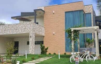 Imagem: A casa em condomínio possui 4 Dormitórios, 5 Banheiros, 4