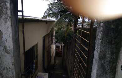 Imagem: A casa possui 2 Dormitórios e 1 Banheiro e está localizado