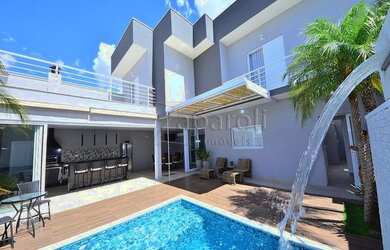 Imagem: A casa em condomínio possui 4 Dormitórios, 5 Banheiros, 4