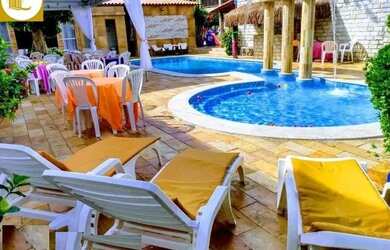 Imagem: A casa possui 5 Dormitórios, 5 Banheiros, 5 Vagas na garagem