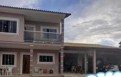 Imagem: A casa possui 4 Dormitórios, 2 Banheiros, 2 Vagas na garagem