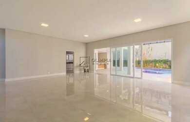 Imagem: A casa possui 4 Dormitórios, 5 Banheiros, 5 Vagas na garagem